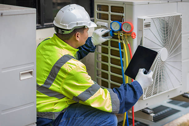 Professional Heat Pump Repair technician working in Sterrett, AL